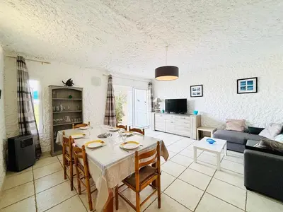 Télévision ou salle de divertissement dans l'établissement Appartement Aria Marina 2 Lumio