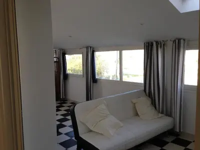Coin salon dans l'établissement maison T3 500m de la plage