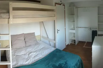 Un ou plusieurs lits dans un hébergement de l'établissement Villa les pieds dans l'eau résidence calme