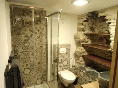 Salle de bains dans l'établissement U MULINU