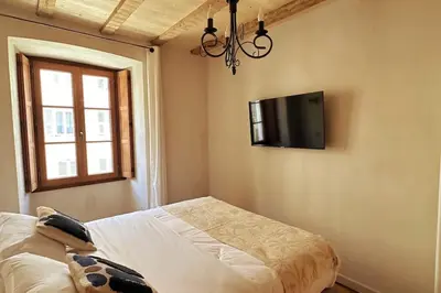 Télévision ou salle de divertissement dans l'établissement Appartement prestige, cour Paoli