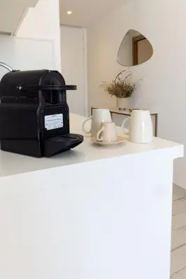 Cuisine ou kitchenette dans l'établissement La Manufacture D'oriano LES NUITS AU VILLAGE
