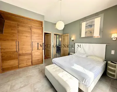 Un ou plusieurs lits dans un hébergement de l'établissement Maison golf de calvi couchers de soleil vue mer LUMIO