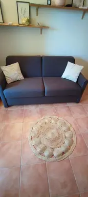 Coin salon dans l'établissement appartement bord de mer en Corse avec 2 piscines 100 metres de la plage