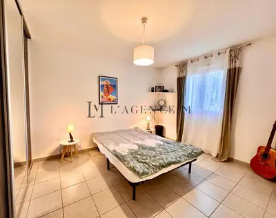Un ou plusieurs lits dans un hébergement de l'établissement Appartement Cardellu Paisible & centre-ville CALVI