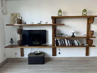 Télévision ou salle de divertissement dans l'établissement BORGO Duplex 4 pers proche mer