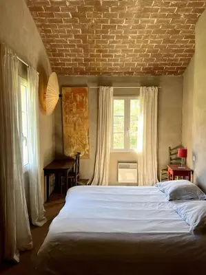 Un ou plusieurs lits dans un hébergement de l'établissement MAISON DE CARACTERE A PIGNA