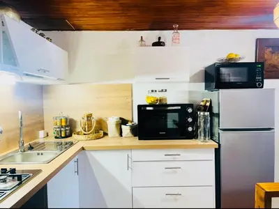 Cuisine ou kitchenette dans l'établissement À casetta