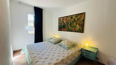 Un ou plusieurs lits dans un hébergement de l'établissement Appartement Cocody 41 LUMIO