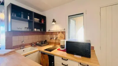 Cuisine ou kitchenette dans l'établissement Appartement Cocody 41 LUMIO