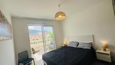 Un ou plusieurs lits dans un hébergement de l'établissement Appartement T3 A Marina 1 LUMIO