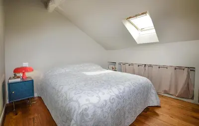 Un ou plusieurs lits dans un hébergement de l'établissement Beautiful Apartment In Bastia
