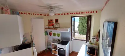 Cuisine ou kitchenette dans l'établissement Maison de village sur la citadelle de Calvi