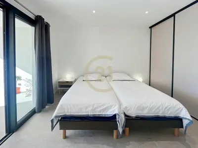 Un ou plusieurs lits dans un hébergement de l'établissement Villa les Marines de Palasca