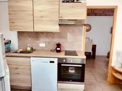Cuisine ou kitchenette dans l'établissement Appartement T2 Porto