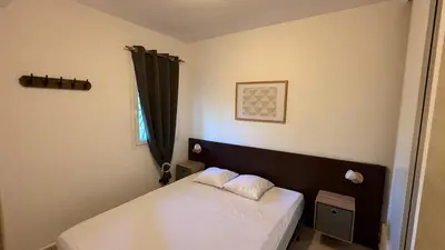 Un ou plusieurs lits dans un hébergement de l'établissement Appartement 2 pièces bord de mer