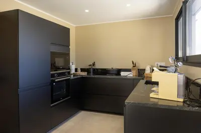 Cuisine ou kitchenette dans l'établissement Villa Vignarella