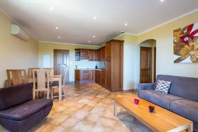 Cuisine ou kitchenette dans l'établissement Appartement Privilège vue mer - Ile Rousse