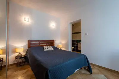 Un ou plusieurs lits dans un hébergement de l'établissement Duplex vue mer - Ile Rousse