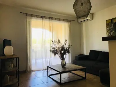 Coin salon dans l'établissement Rez de chaussez de villa 4 personnes mer