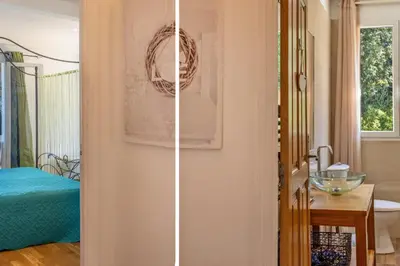 Un ou plusieurs lits dans un hébergement de l'établissement Villa A Surgenta