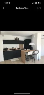 Cuisine ou kitchenette dans l'établissement Appartement moderne dans résidence A2023