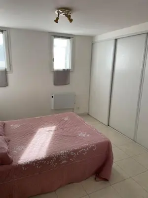 Un ou plusieurs lits dans un hébergement de l'établissement Rdc de villa