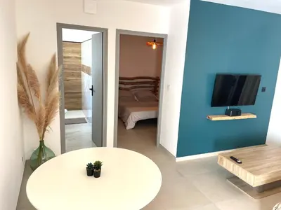 Un ou plusieurs lits dans un hébergement de l'établissement Mini maison entre mer et montagne