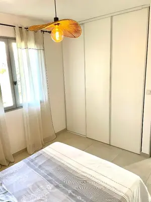 Un ou plusieurs lits dans un hébergement de l'établissement Mini maison entre mer et montagne