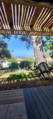 Jardin de l'établissement Petite maison en Balagne, belle vue mer