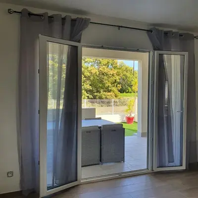 Coin salon dans l'établissement appartement Oliviaaxelle