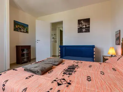 Un ou plusieurs lits dans un hébergement de l'établissement Holiday Home Agula Marina by Interhome