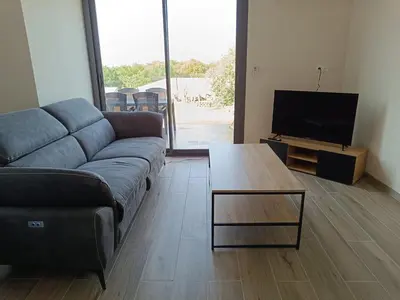 Télévision ou salle de divertissement dans l'établissement Dume et Coco F2 55 M2 Vue mer