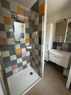 Salle de bains dans l'établissement Maison a la plage