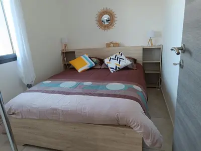 Un ou plusieurs lits dans un hébergement de l'établissement Doume et Coco T1 30M2 Vue mer