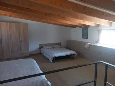 Un ou plusieurs lits dans un hébergement de l'établissement maison de vacances olmi cappella Corse