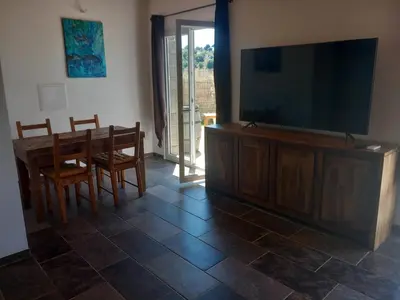 Télévision ou salle de divertissement dans l'établissement maison de vacances olmi cappella Corse