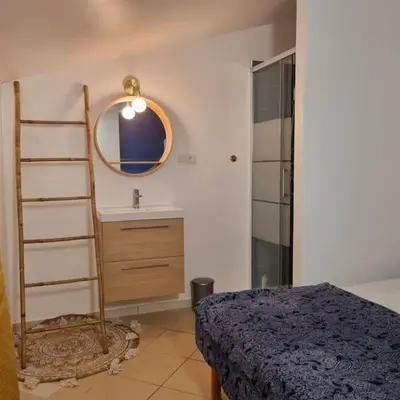 Un ou plusieurs lits dans un hébergement de l'établissement Maison en duplex dans résidence à 400m de la mer