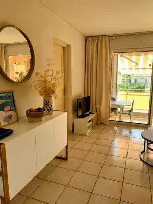 Télévision ou salle de divertissement dans l'établissement Chez Aline - Appartement en bord de mer