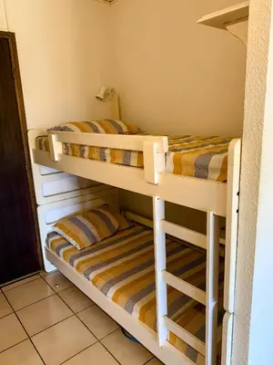 Un ou plusieurs lits dans un hébergement de l'établissement Chez Aline - Appartement en bord de mer