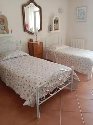Un ou plusieurs lits dans un hébergement de l'établissement Maison des pruniers