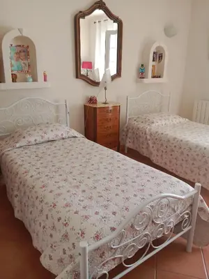 Un ou plusieurs lits dans un hébergement de l'établissement Maison des pruniers