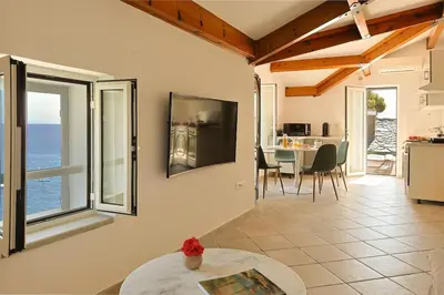 Télévision ou salle de divertissement dans l'établissement Casa Di U Mare