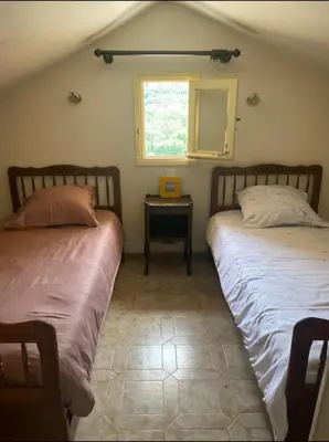 Un ou plusieurs lits dans un hébergement de l'établissement Maison de Léon