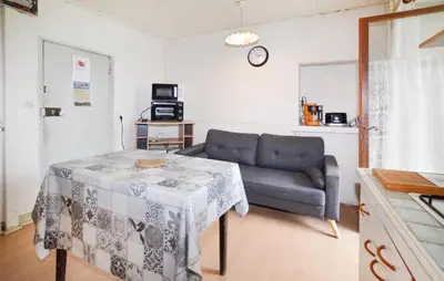 Coin salon dans l'établissement Nice Apartment In Sant Andrea Di Bozio