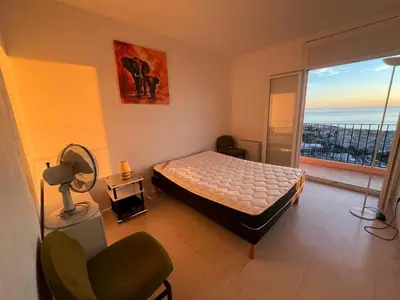 Un ou plusieurs lits dans un hébergement de l'établissement Appartement vintage Bastia - MAGNIFIQUE VUE !