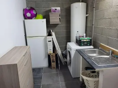 Cuisine ou kitchenette dans l'établissement Charmante villa avec jardin