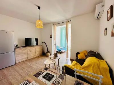 Télévision ou salle de divertissement dans l'établissement Casa Tania