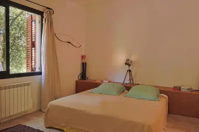 Un ou plusieurs lits dans un hébergement de l'établissement Villa Canapaggio