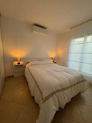 Un ou plusieurs lits dans un hébergement de l'établissement Villa avec piscine à quelques minutes de la mer